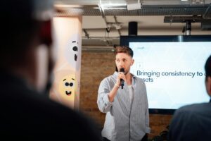 man speaking at business presentation